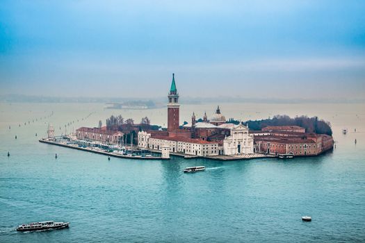 Venice from the air - San Giorgio Maggiore. -Venetian lagoon with ships and San Giorgio Maggiore aerial view
