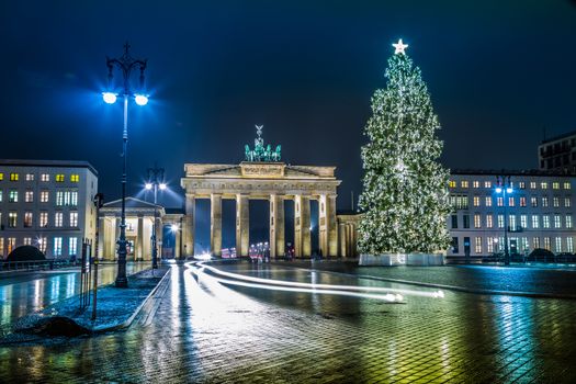 BRANDENBURG GATE, Berlin, Germany at night. Road side view