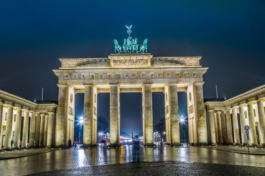 BRANDENBURG GATE, Berlin, Germany at night. Road side view