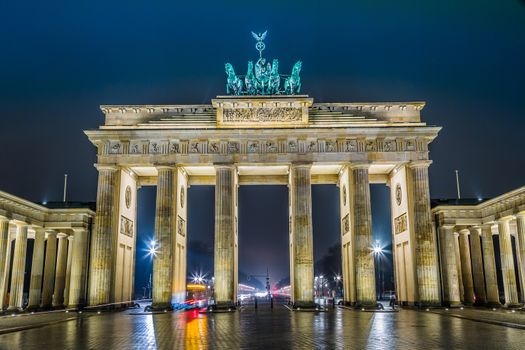 BRANDENBURG GATE, Berlin, Germany at night. Road side view