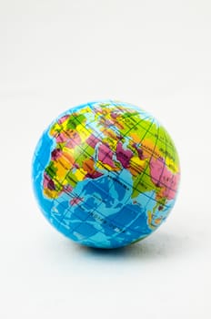 The World Globe Made of Rubber on a White Background