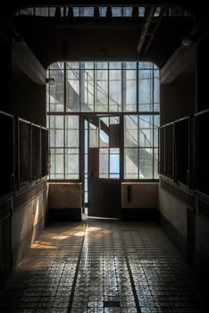 Industrial interior with br light from the windows