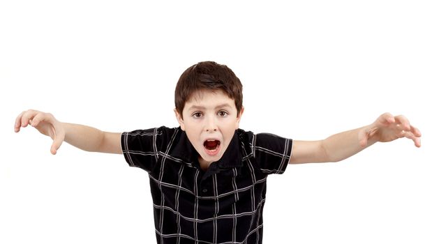 Young boy grimacing and scares isolated on white background