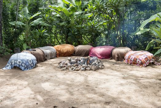 seat around the campfire in nature