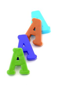 Close-up of letters. "A" letters line.
