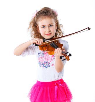 Little cute girl playing the violin isolated on white.