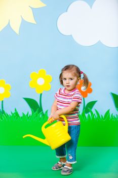Lovely baby girl wearing colorful summer dress with balloon on Fashion and Beauty Summer theme