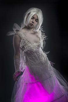 Sexy. Beautiful model with long white hair and vintage corset