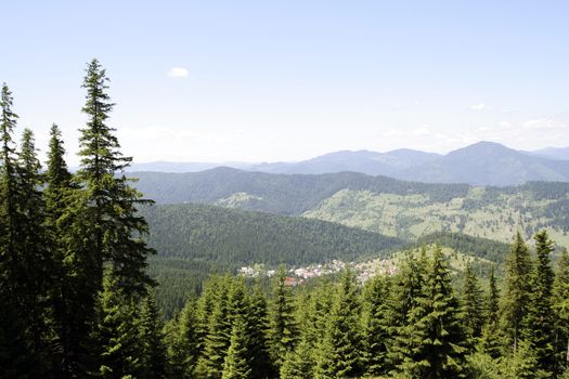 Mountains with green forest landscape.