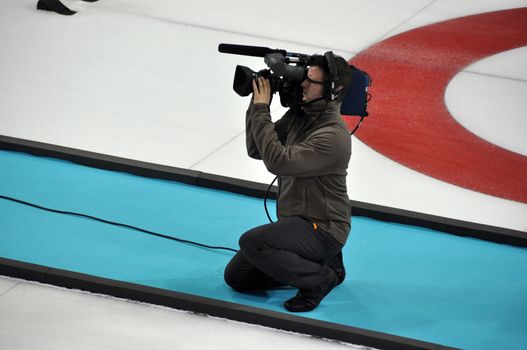 Camera man at XXII Winter Olympic Games Sochi 2014, Russia