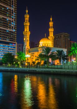 Al Noor Mosque in Sharjah at night. United Arab Emirates