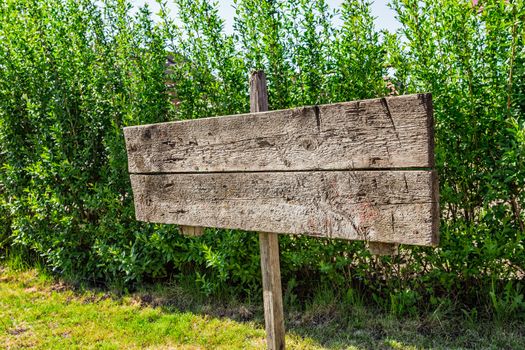 sign a pointer to the board in rural areas