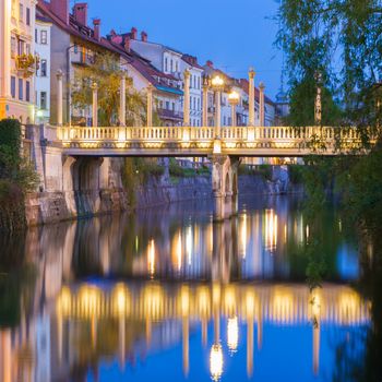 Romantic medieval Ljubljana's city center, the capital of Slovenia, Europe. New square and Ljubljanica river bank.