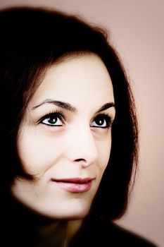 Portrait of a happy beautiful woman with green eyes.