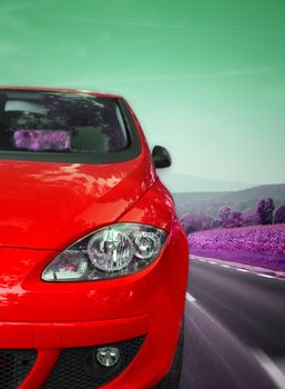 Image of a car viewed from the front on the highway