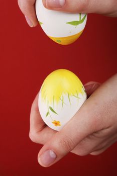 Bumping painted eggs in easter day
