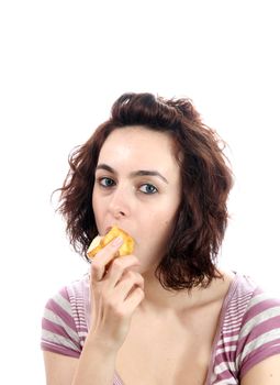 Hungry woman eating a pear