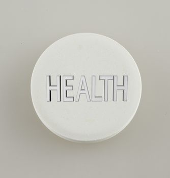 White pill with text "Health" on top, gray background