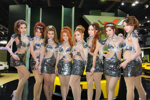 BANGKOK, THAILAND - MARCH 30, 2014: Unidentified female presenter pose in the 35th Bangkok International Motor Show on March 30, 2014 in Bangkok, Thailand.