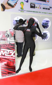 BANGKOK, THAILAND - MARCH 30, 2014: Unidentified female presenter pose in the 35th Bangkok International Motor Show on March 30, 2014 in Bangkok, Thailand.