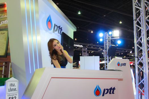 BANGKOK, THAILAND - MARCH 30, 2014: Unidentified female presenter pose in the 35th Bangkok International Motor Show on March 30, 2014 in Bangkok, Thailand.