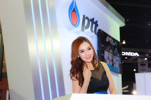 BANGKOK, THAILAND - MARCH 30, 2014: Unidentified female presenter pose in the 35th Bangkok International Motor Show on March 30, 2014 in Bangkok, Thailand.