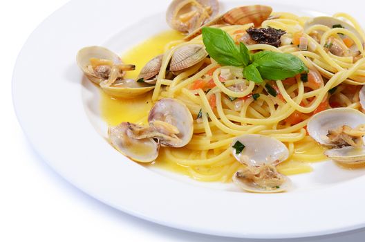 Spaghetti with mussels in bowls close up