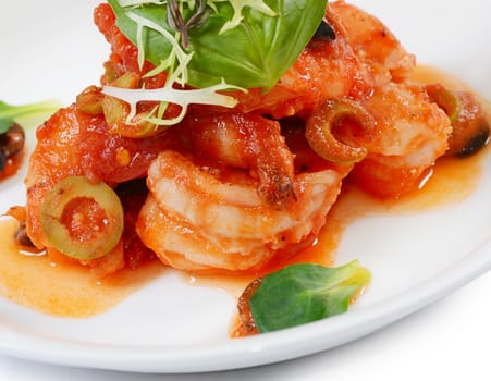 The shrimps in tomato sauce with olives