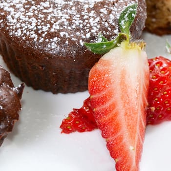 The chocolate cake with strawberry close up