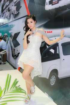 BANGKOK, THAILAND - MARCH 30, 2014: Unidentified female presenter pose in the 35th Bangkok International Motor Show on March 30, 2014 in Bangkok, Thailand.