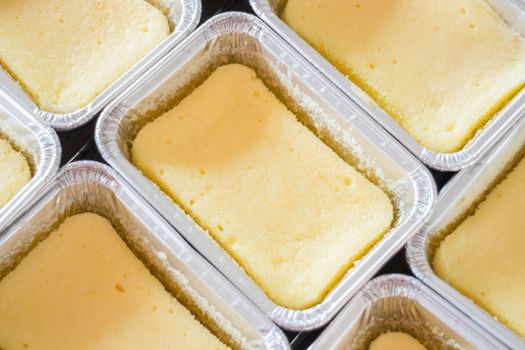 Square box of cheese base cake, stock photo