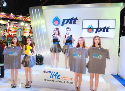 BANGKOK, THAILAND - MARCH 30, 2014: Unidentified female presenter pose in the 35th Bangkok International Motor Show on March 30, 2014 in Bangkok, Thailand.