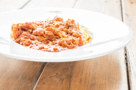 Ready meal of pasta tomato pork sauce, stock photo