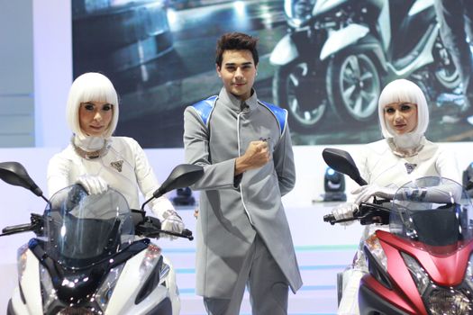 BANGKOK, THAILAND - MARCH 30, 2014: Unidentified female presenter pose in the 35th Bangkok International Motor Show on March 30, 2014 in Nonthaburi, Thailand.