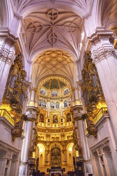 Basilica Stone Columns Stained Glass Cathedral Andalusia Granada Spain.  Built in the 1500s, housing the tombs of King Ferdinand and Isabella.  Dome by Diego de Siloe, 16th Century Stained Glass by Juan del Campo.