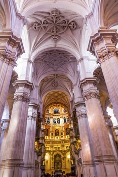 Basilica Stone Columns Stained Glass Cathedral Andalusia Granada Spain.  Built in the 1500s, housing the tombs of King Ferdinand and Isabella.  Dome by Diego de Siloe, 16th Century Stained Glass by Juan del Campo.