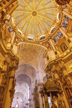 Basilica Dome Stained Glass Cathedral Andalusia Granada Spain.  Built in the 1500s, housing the tombs of King Ferdinand and Isabella.  Dome by Diego de Siloe, 16th Century Stained Glass by Juan del Campo.