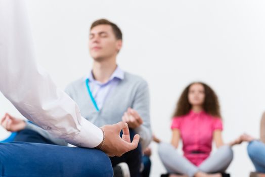 close-up of a human hand, meditates in the workplace