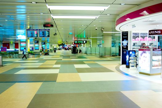 SINGAPORE - MARCH 05, 2013 : Modern interior of Changi International Airport in Singapore. Changi Airport serves more than 100 airlines operating 6,100 weekly flights