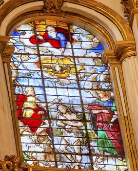 Baptism Stained Glass Basilica Cathedral Andalusia Granada Spain.  16th Century Stained Glass by Juan del Campo.  Built in the 1500s, housing the tombs of King Ferdinand and Isabella.  