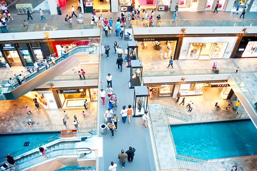 SINGAPORE - MAY 09, 2013: Shopping mall at Marina Bay Sands Resort in Singapore. It is billed as the world's most expensive standalone casino property at S$8 billion