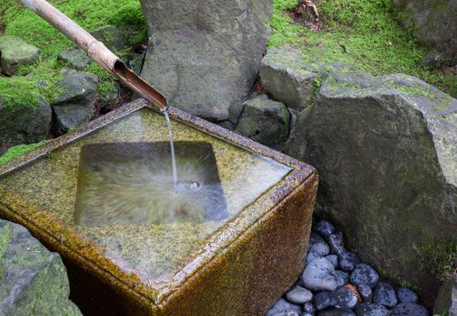 Slow shutter shot of Japanese water fountain