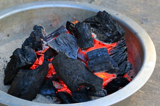 Hot charcoal in the bowl