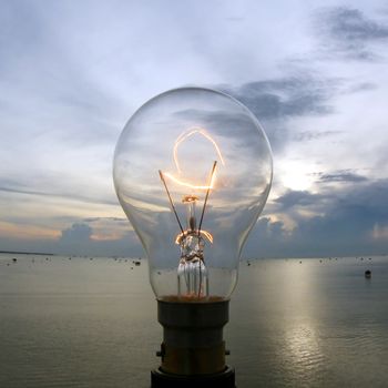 the lightbulb on beautiful sky background