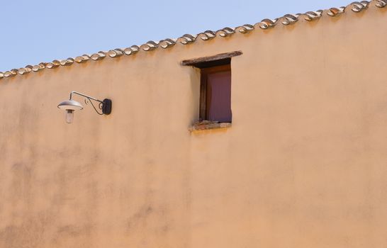 Minimalist wall with window and lamp post