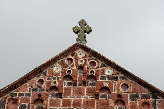 Cross on top of a church in Sardinia