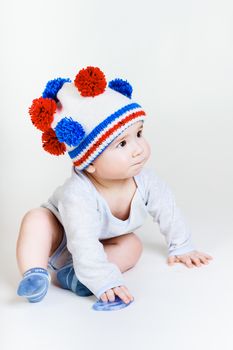 cute baby in a funny knitted hat