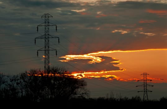 pylons on the background of the setting sun