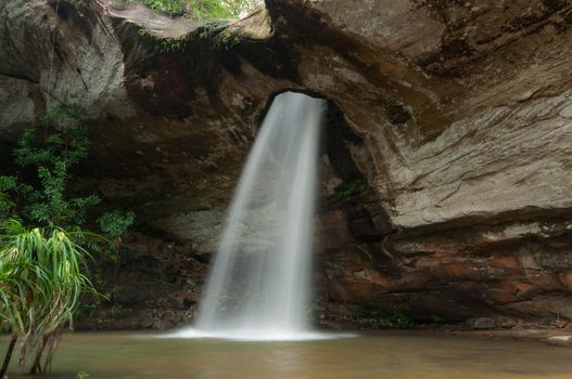 Waterfalls flow down the hole at ubon ratchathani, Thailand.