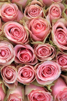 Pink roses in a bridal decorative arrangement